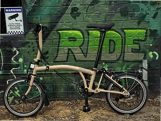 Brompton C Line Explore Folding Bike with Rack and front bag - Mid (6-speed)